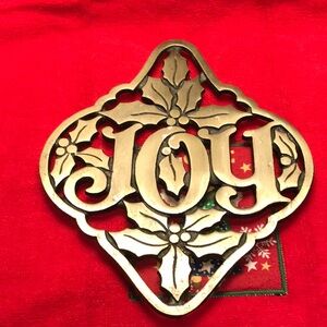 Beautiful distressed brass trivet. Great to use, or hang up for decor